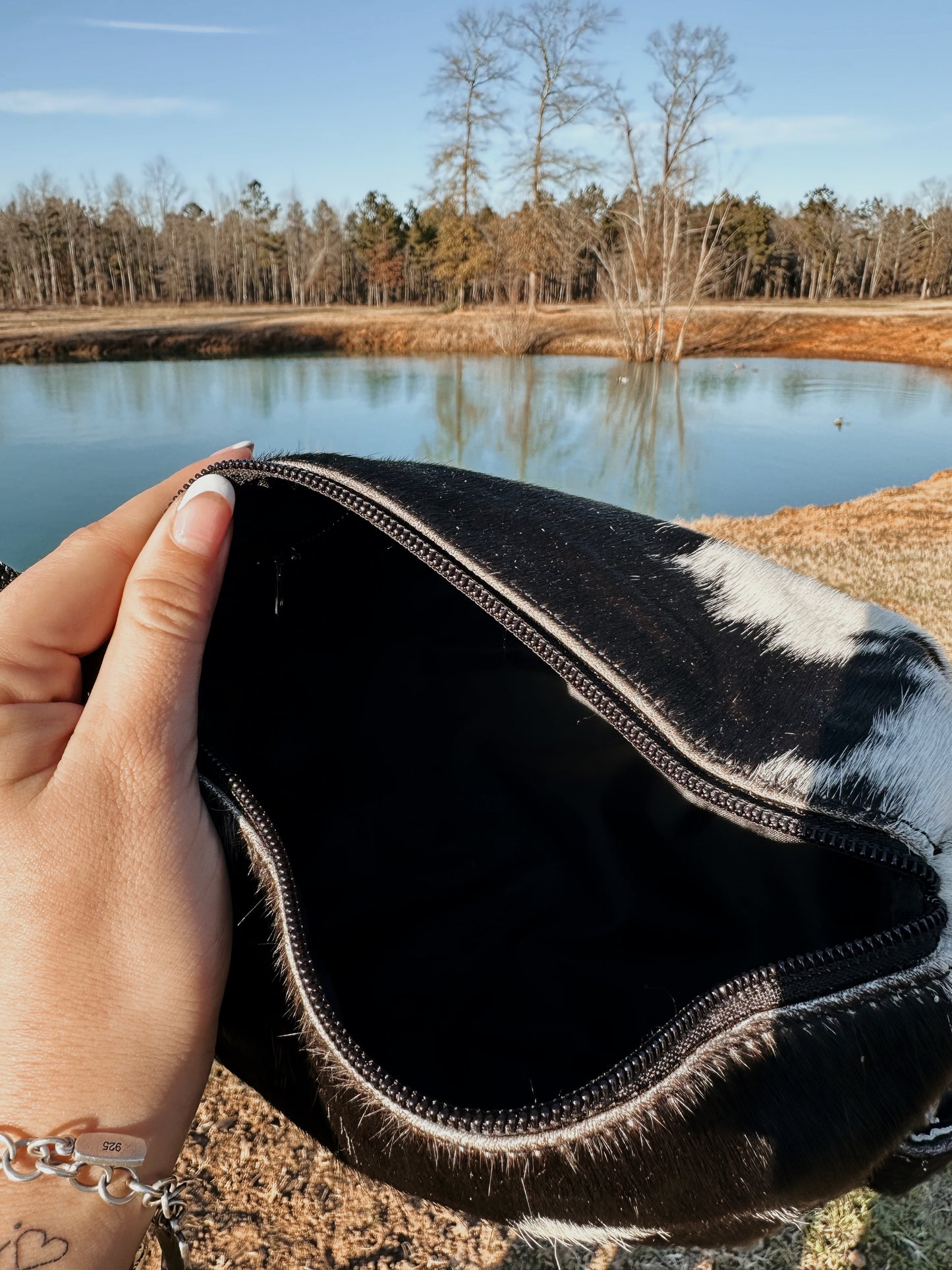 Cowhide toiletry bag - black